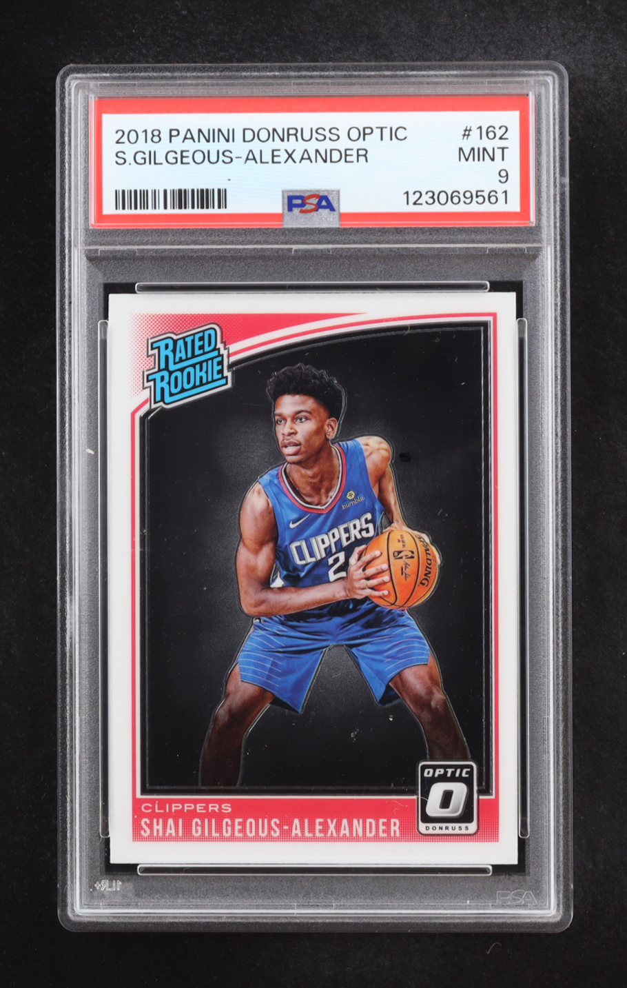 Shai Gilgeous-Alexander 2018-19 Donruss Optic #162 RR RC (PSA 9) at PristineAuction.com Shai Gilgeous-Alexander 2018-19 Donruss Optic #162 RR RC (PSA 9) at PristineAuction.com
