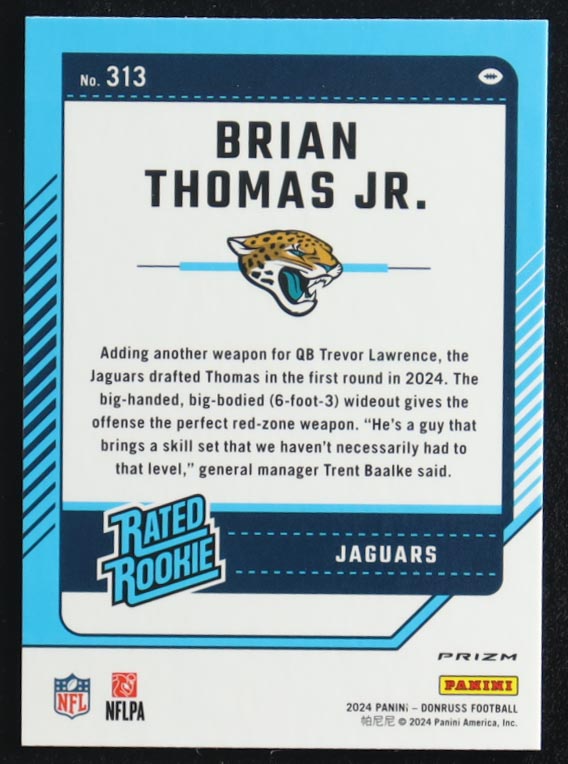 Brian Thomas Jr. 2024 Panini Donruss Optic Rated Rookie Red Pandora Prizm #313 RC at PristineAuction.com Brian Thomas Jr. 2024 Panini Donruss Optic Rated Rookie Red Pandora Prizm #313 RC at PristineAuction.com