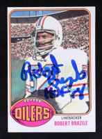 Robert Brazile Signed 1976 Topps #424 RC Inscribed "HOF 18" (Beckett) at PristineAuction.com