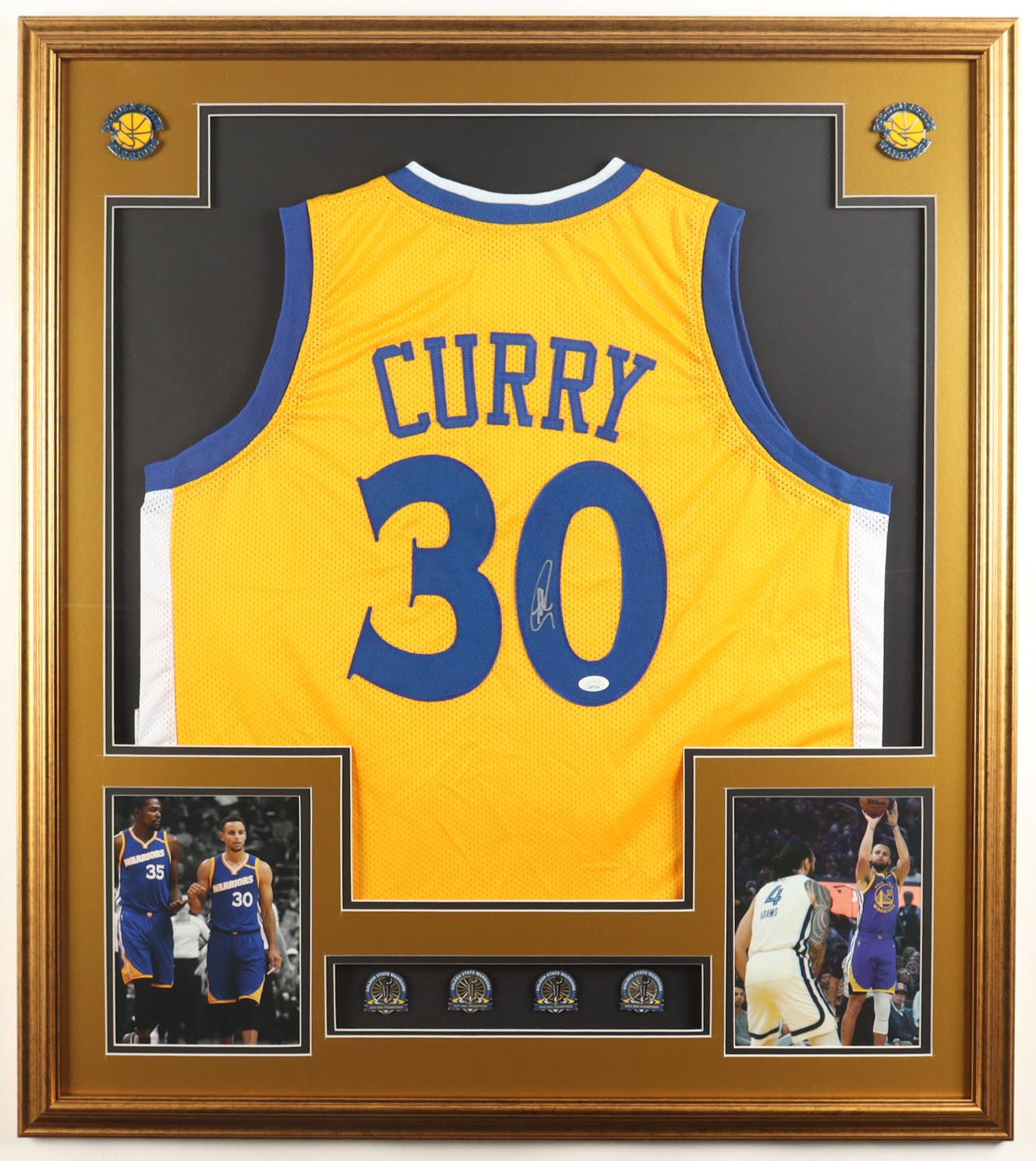 Stephen Curry Signed Custom Framed Jersey Display with (4) NBA Finals Pins & (2) Metal Team Logo Emblems (JSA) at PristineAuction.com Stephen Curry Signed Custom Framed Jersey Display with (4) NBA Finals Pins & (2) Metal Team Logo Emblems (JSA) at PristineAuction.com