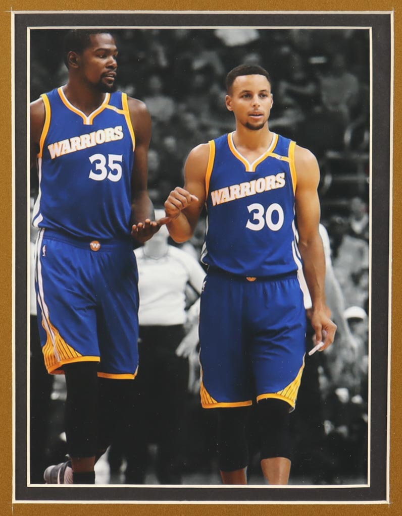 Stephen Curry Signed Custom Framed Jersey Display with (4) NBA Finals Pins & (2) Metal Team Logo Emblems (JSA) at PristineAuction.com Stephen Curry Signed Custom Framed Jersey Display with (4) NBA Finals Pins & (2) Metal Team Logo Emblems (JSA) at PristineAuction.com