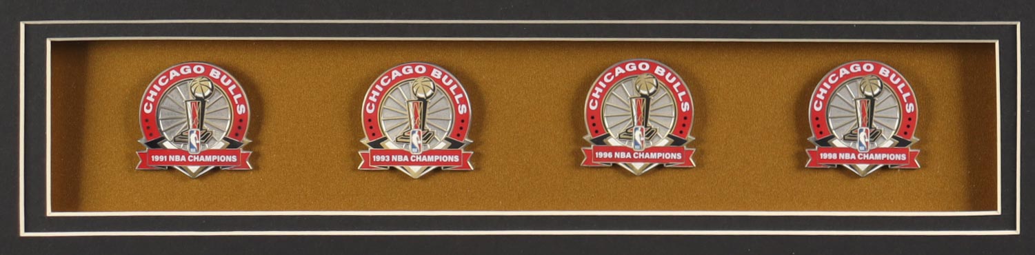 Michael Jordan Custom Framed Jersey Display with (4) Bulls Finals Pins & (2) Cloth Bulls Logo Patches at PristineAuction.com Michael Jordan Custom Framed Jersey Display with (4) Bulls Finals Pins & (2) Cloth Bulls Logo Patches at PristineAuction.com