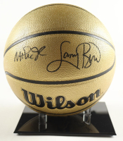 Larry Bird & Magic Johnson Signed NBA Basketball With Display Stand (PSA & Beckett) at PristineAuction.com