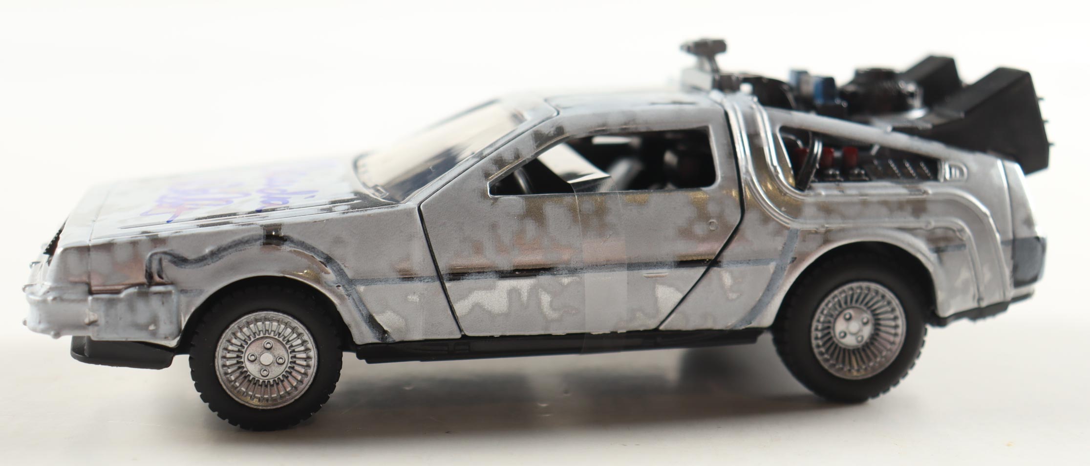 Claudia Wells Signed "Back to the Future" DeLorean Time Machine 1:32 Scale Die-Cast Car (Beckett) at PristineAuction.com Claudia Wells Signed "Back to the Future" DeLorean Time Machine 1:32 Scale Die-Cast Car (Beckett) at PristineAuction.com
