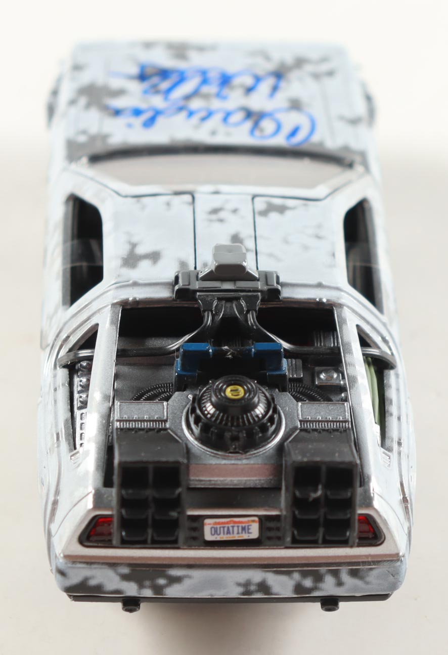 Claudia Wells Signed "Back to the Future" DeLorean Time Machine 1:32 Scale Die-Cast Car (Beckett) at PristineAuction.com Claudia Wells Signed "Back to the Future" DeLorean Time Machine 1:32 Scale Die-Cast Car (Beckett) at PristineAuction.com