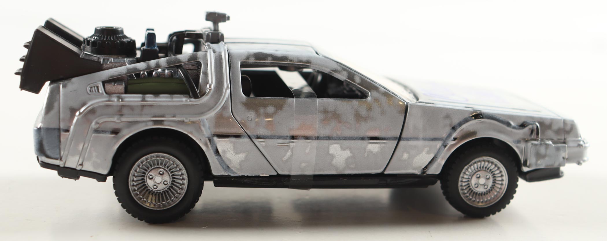 Claudia Wells Signed "Back to the Future" DeLorean Time Machine 1:32 Scale Die-Cast Car (Beckett) at PristineAuction.com Claudia Wells Signed "Back to the Future" DeLorean Time Machine 1:32 Scale Die-Cast Car (Beckett) at PristineAuction.com