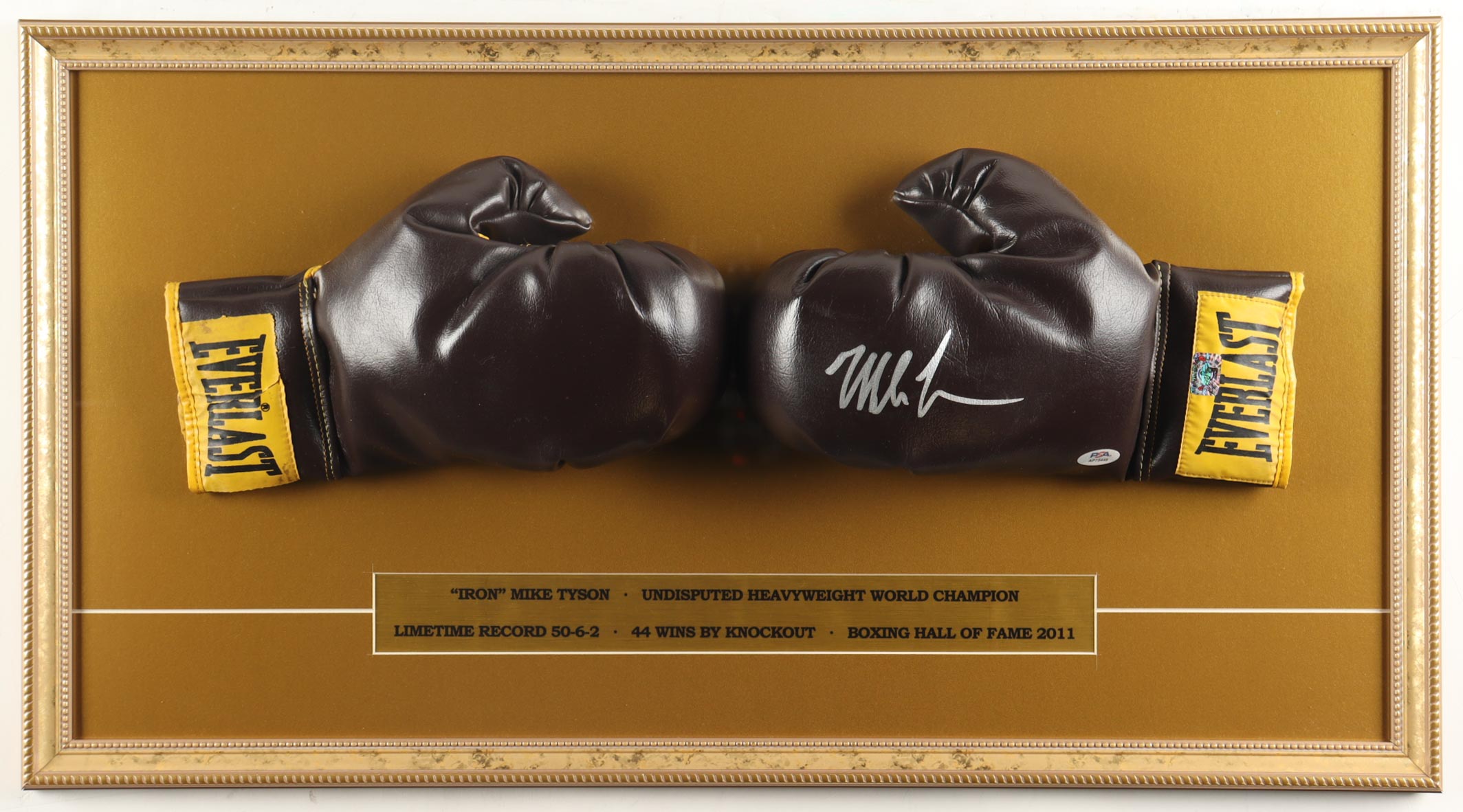Mike Tyson Signed Custom Framed Vintage Everlast Glove Set Display (Tyson & PSA) at PristineAuction.com Mike Tyson Signed Custom Framed Vintage Everlast Glove Set Display (Tyson & PSA) at PristineAuction.com