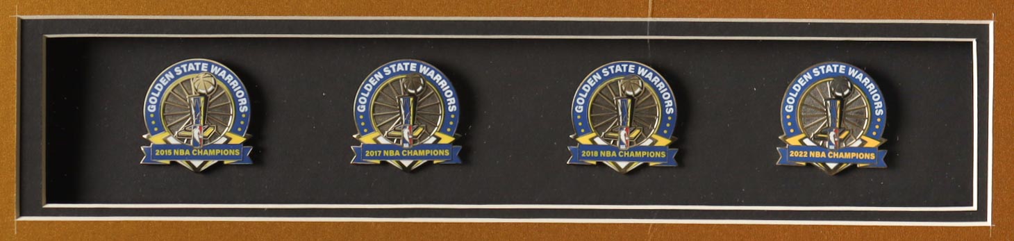 Stephen Curry Signed Custom Framed Jersey Display with (4) NBA Finals Pins & (2) Metal Team Logo Emblems (JSA) at PristineAuction.com Stephen Curry Signed Custom Framed Jersey Display with (4) NBA Finals Pins & (2) Metal Team Logo Emblems (JSA) at PristineAuction.com