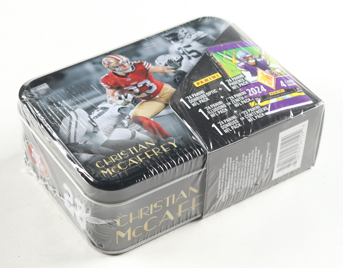 Christian McCaffrey Panini 2025 Championship Collection Football Tin with (4) Packs at PristineAuction.com Christian McCaffrey Panini 2025 Championship Collection Football Tin with (4) Packs at PristineAuction.com