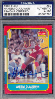 Hakeem Olajuwon Signed 1986-87 Fleer #82 RC (PSA) at PristineAuction.com