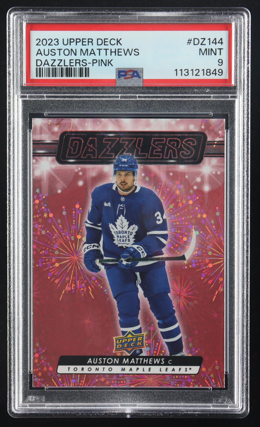 Auston Matthews 2023 Upper Deck Extended Series Dazzlers Pink #DZ144 RC (PSA 9) at PristineAuction.com Auston Matthews 2023 Upper Deck Extended Series Dazzlers Pink #DZ144 RC (PSA 9) at PristineAuction.com