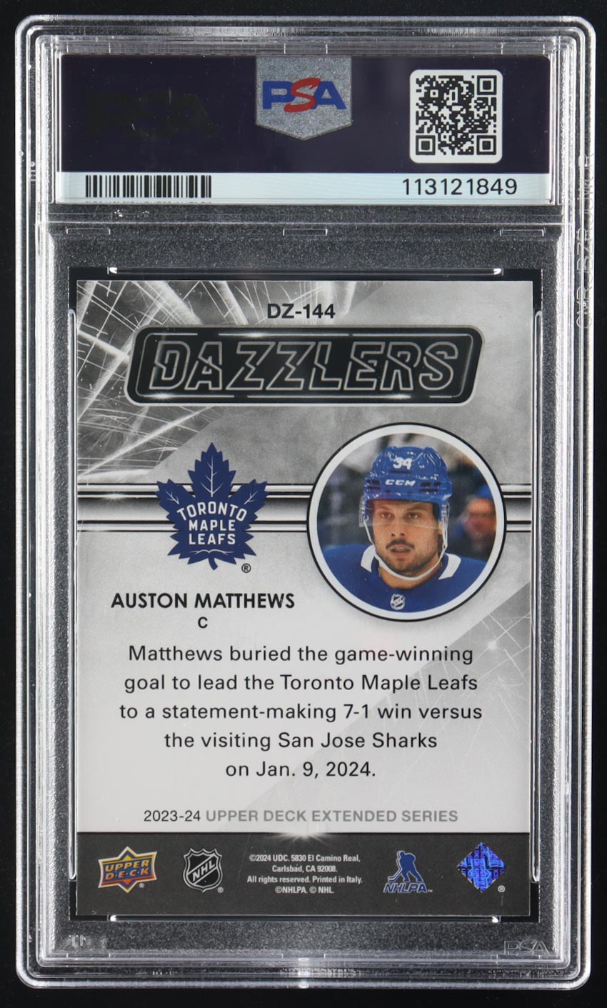 Auston Matthews 2023 Upper Deck Extended Series Dazzlers Pink #DZ144 RC (PSA 9) at PristineAuction.com Auston Matthews 2023 Upper Deck Extended Series Dazzlers Pink #DZ144 RC (PSA 9) at PristineAuction.com
