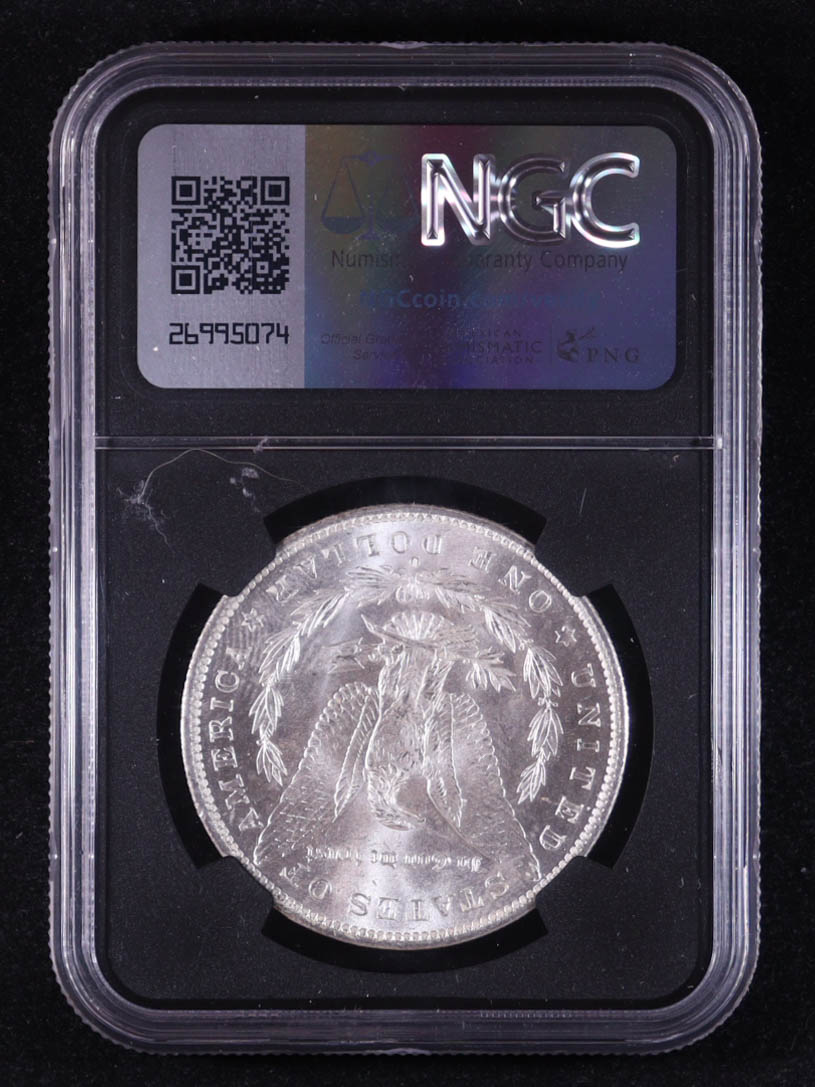 1883-O Morgan Silver Dollar - Original Bag Fragment Relic (NGC BRILLIANT UNCIRCULATED) at PristineAuction.com 1883-O Morgan Silver Dollar - Original Bag Fragment Relic (NGC BRILLIANT UNCIRCULATED) at PristineAuction.com