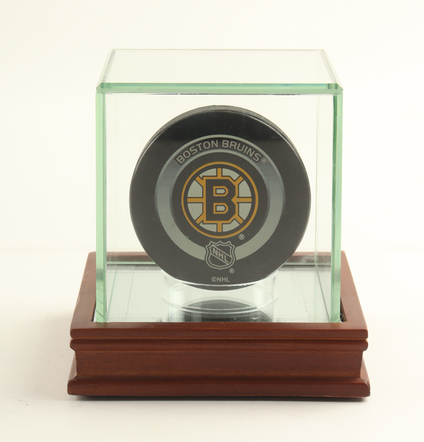 Official Game Issued Boston Bruins Logo Hockey Puck at PristineAuction.com Official Game Issued Boston Bruins Logo Hockey Puck at PristineAuction.com