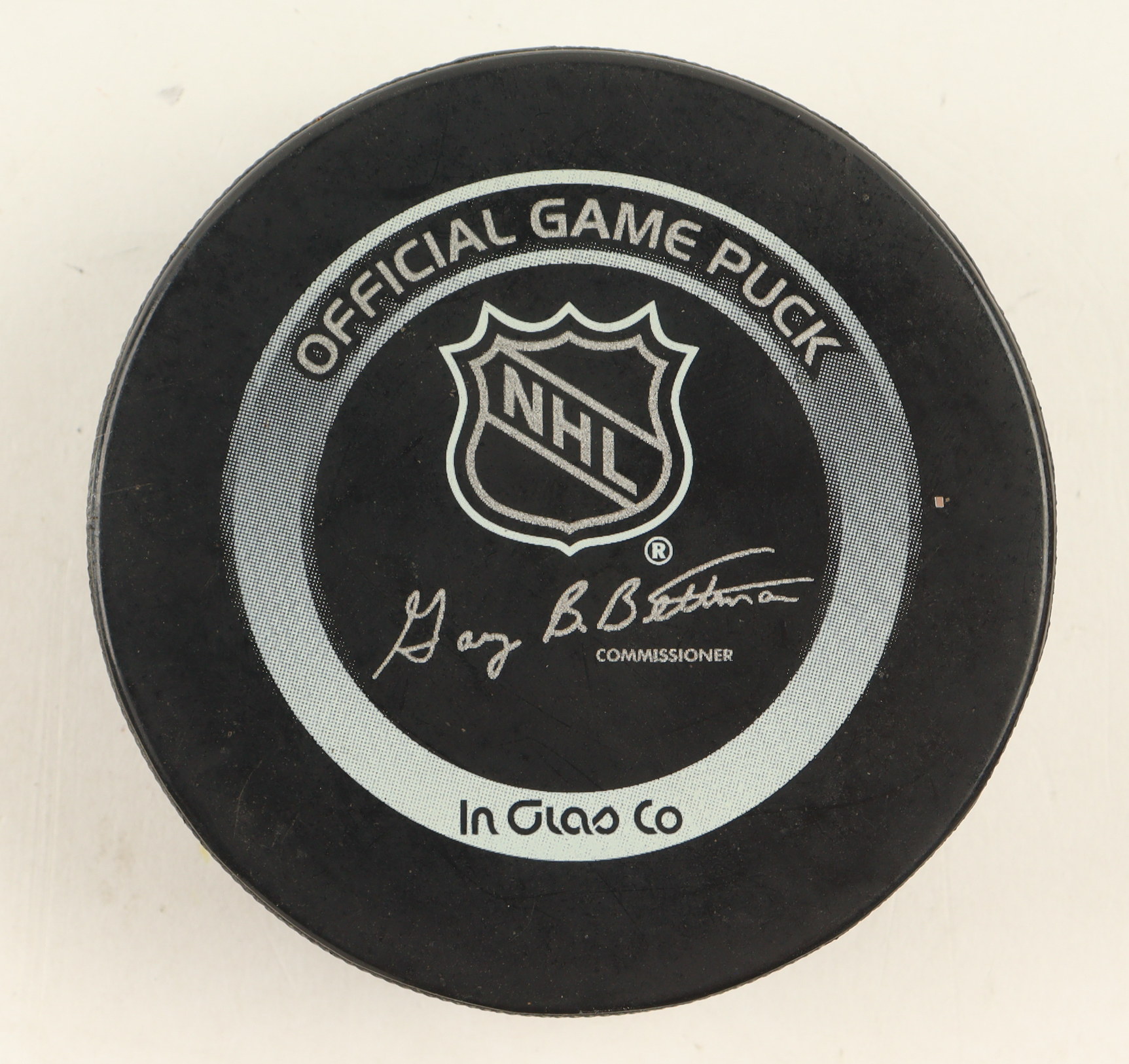 Official Game Issued Boston Bruins Logo Hockey Puck at PristineAuction.com Official Game Issued Boston Bruins Logo Hockey Puck at PristineAuction.com