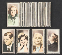1936 Godfrey Phillips Stars of the Screen Complete Set of (48) Cigarette Cards with Jean Harlow #18, Shirley Temple #25, Katharine Hepburn #15, Clark Gable #12 at PristineAuction.com