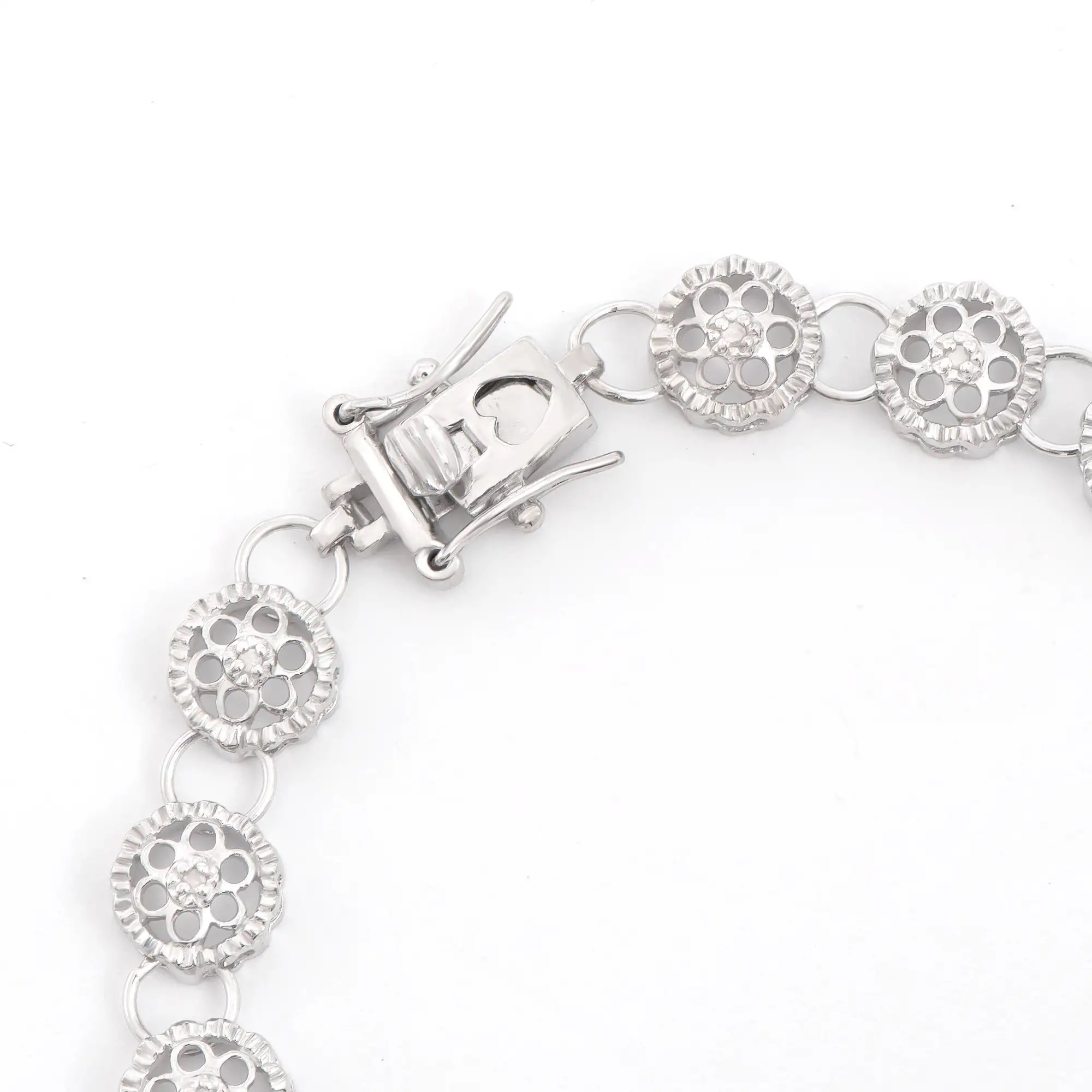 .13 CTW Natural Diamonds Rhodium Plated Designer Bracelet Size 7.5 Inches | Estimated Value $2,049 (AMG) at PristineAuction.com .13 CTW Natural Diamonds Rhodium Plated Designer Bracelet Size 7.5 Inches | Estimated Value $2,049 (AMG) at PristineAuction.com
