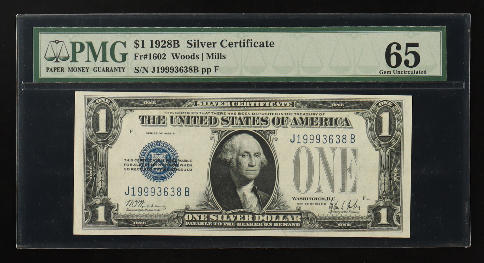 1928-B U.S. $1 "Funny Back" Silver Certificate, Blue Seal - Fr. 1602 - Signed: Woods / Mills (PMG Gem Uncirculated 65) at PristineAuction.com 1928-B U.S. $1 "Funny Back" Silver Certificate, Blue Seal - Fr. 1602 - Signed: Woods / Mills (PMG Gem Uncirculated 65) at PristineAuction.com