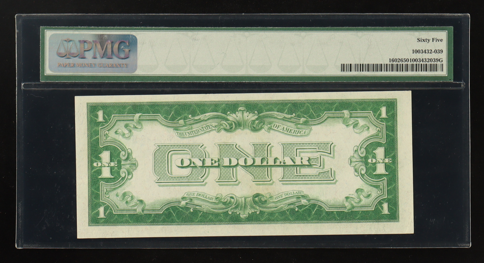 1928-B U.S. $1 "Funny Back" Silver Certificate, Blue Seal - Fr. 1602 - Signed: Woods / Mills (PMG Gem Uncirculated 65) at PristineAuction.com 1928-B U.S. $1 "Funny Back" Silver Certificate, Blue Seal - Fr. 1602 - Signed: Woods / Mills (PMG Gem Uncirculated 65) at PristineAuction.com