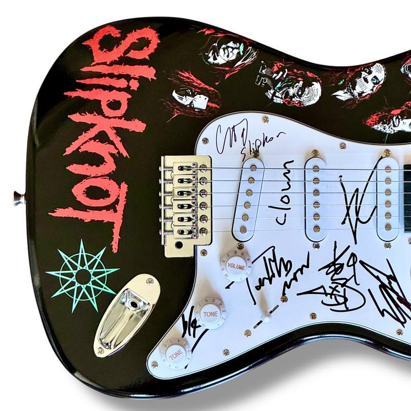 "Slipknot" Custom Stratocaster Guitar Band-Signed By (8) with Corey Taylor, Shawn Crahan, Mick Thomson (JSA) at PristineAuction.com "Slipknot" Custom Stratocaster Guitar Band-Signed By (8) with Corey Taylor, Shawn Crahan, Mick Thomson (JSA) at PristineAuction.com