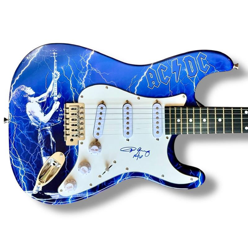 Angus Young Signed "AC/DC" Custom Stratocaster Guitar Inscribed "AC/DC" (JSA) at PristineAuction.com Angus Young Signed "AC/DC" Custom Stratocaster Guitar Inscribed "AC/DC" (JSA) at PristineAuction.com