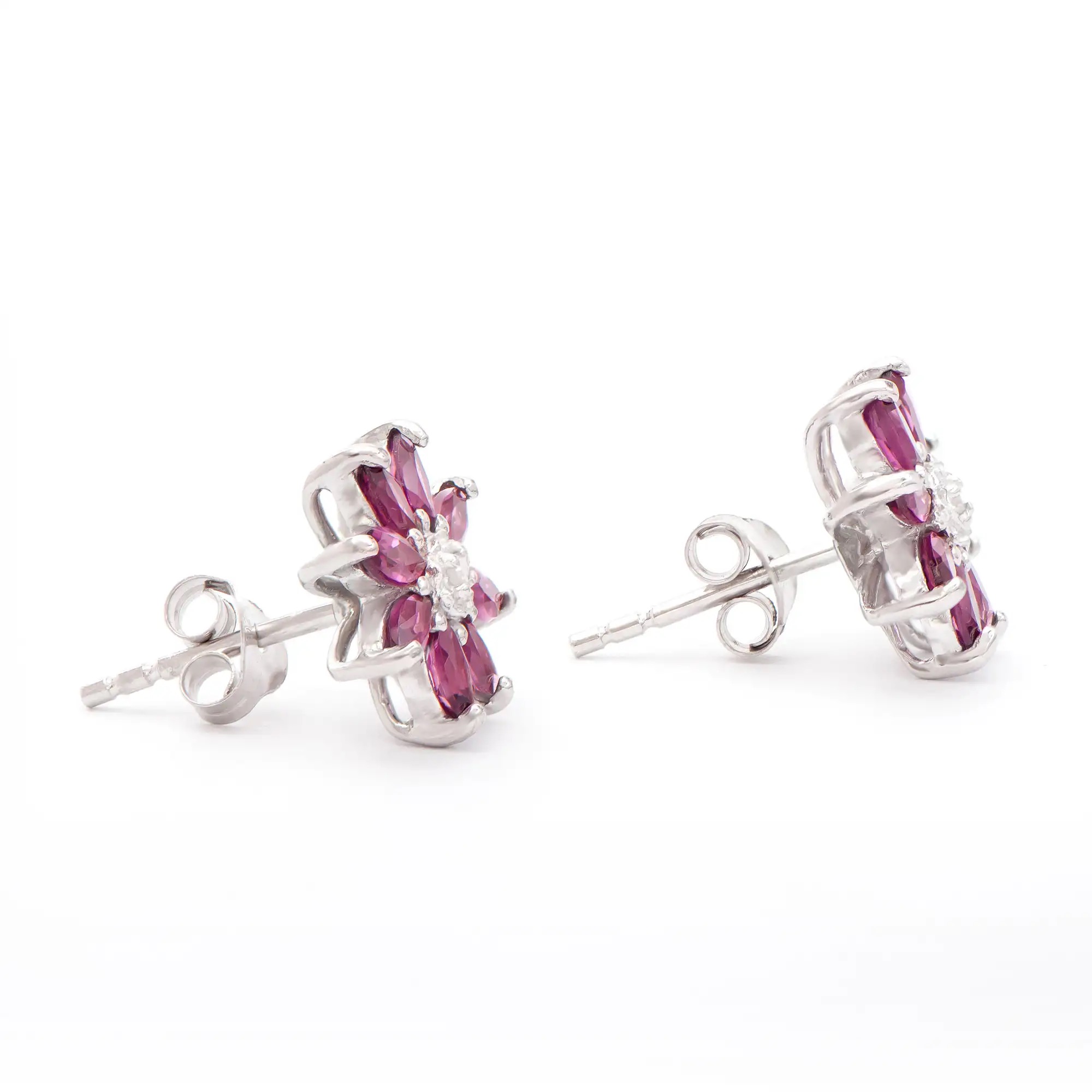 1.22 CTW Natural Diamonds & Rhodolite Garnet Rhodium Plated Designer Earrings | Estimated Retail Value: $1,289 (AMG) at PristineAuction.com 1.22 CTW Natural Diamonds & Rhodolite Garnet Rhodium Plated Designer Earrings | Estimated Retail Value: $1,289 (AMG) at PristineAuction.com