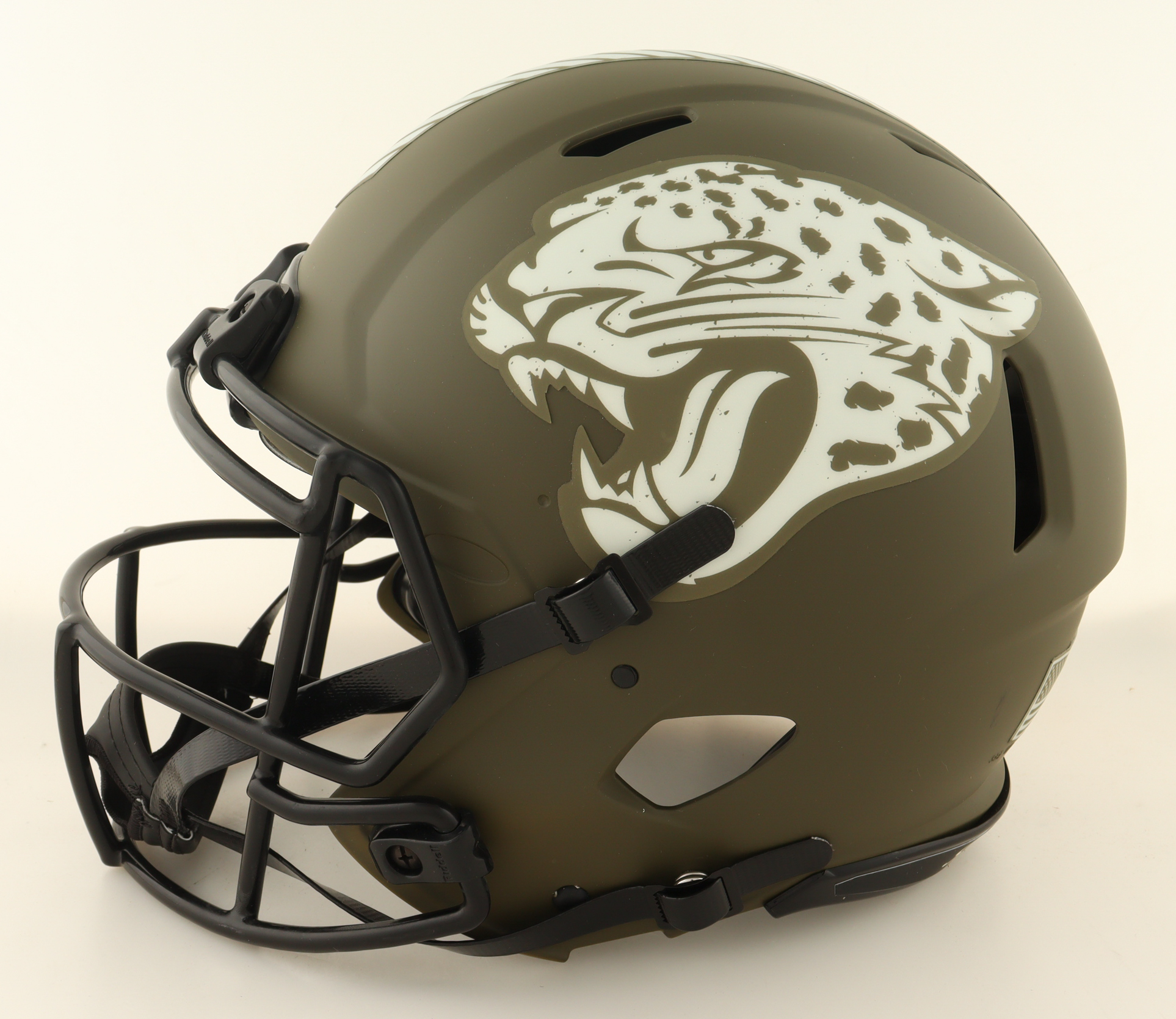 Travis Etienne Jr. Signed Jaguars Full-Size Authentic On-Field Salute To Service Alternate Speed Helmet (JSA) at PristineAuction.com Travis Etienne Jr. Signed Jaguars Full-Size Authentic On-Field Salute To Service Alternate Speed Helmet (JSA) at PristineAuction.com