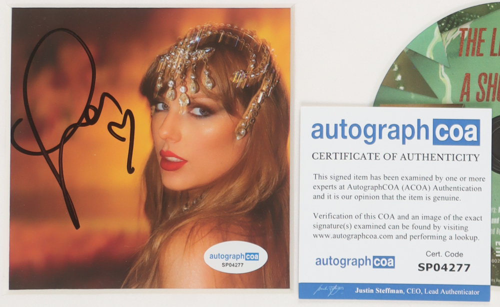 Taylor Swift Signed "The Life of a Showgirl" Custom Framed CD Insert Display (ACOA) at PristineAuction.com Taylor Swift Signed "The Life of a Showgirl" Custom Framed CD Insert Display (ACOA) at PristineAuction.com