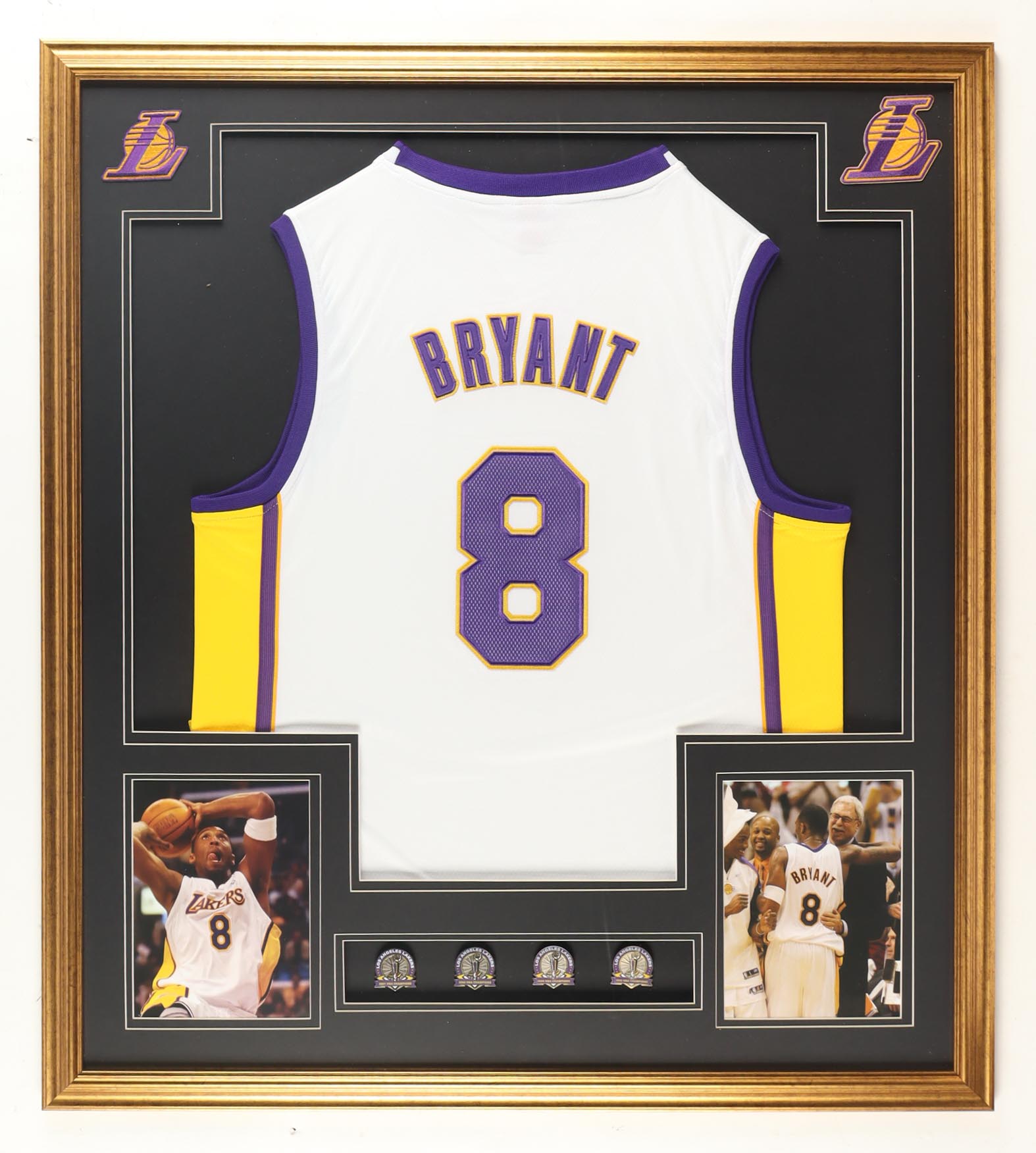 Kobe Bryant Custom Framed Jersey Display with (4) Championship Pins at PristineAuction.com Kobe Bryant Custom Framed Jersey Display with (4) Championship Pins at PristineAuction.com
