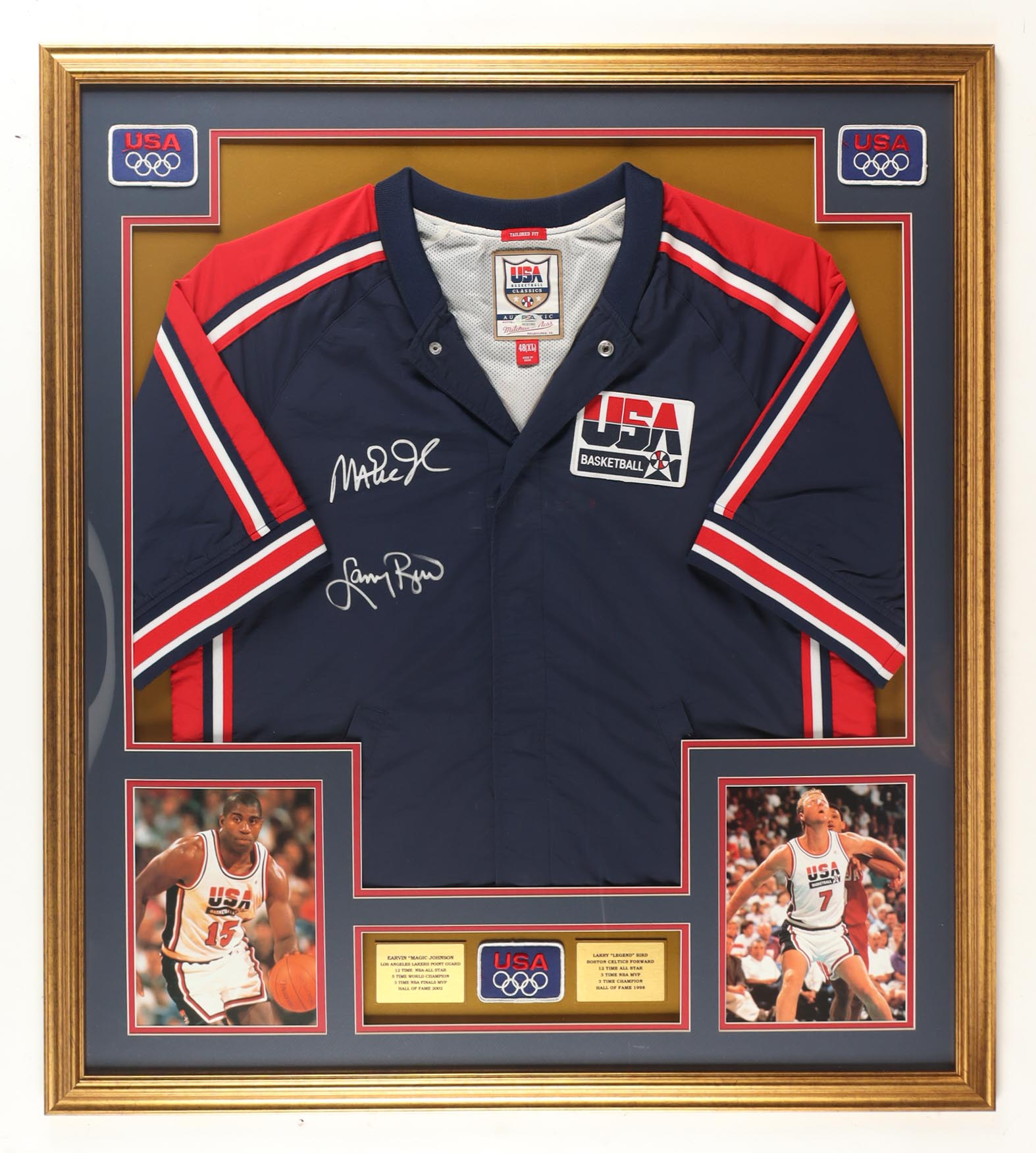 Larry Bird & Magic Johnson Signed Custom Framed Warm Up Top Display with (2) Stat Plaques & USA Patch (PSA) at PristineAuction.com Larry Bird & Magic Johnson Signed Custom Framed Warm Up Top Display with (2) Stat Plaques & USA Patch (PSA) at PristineAuction.com