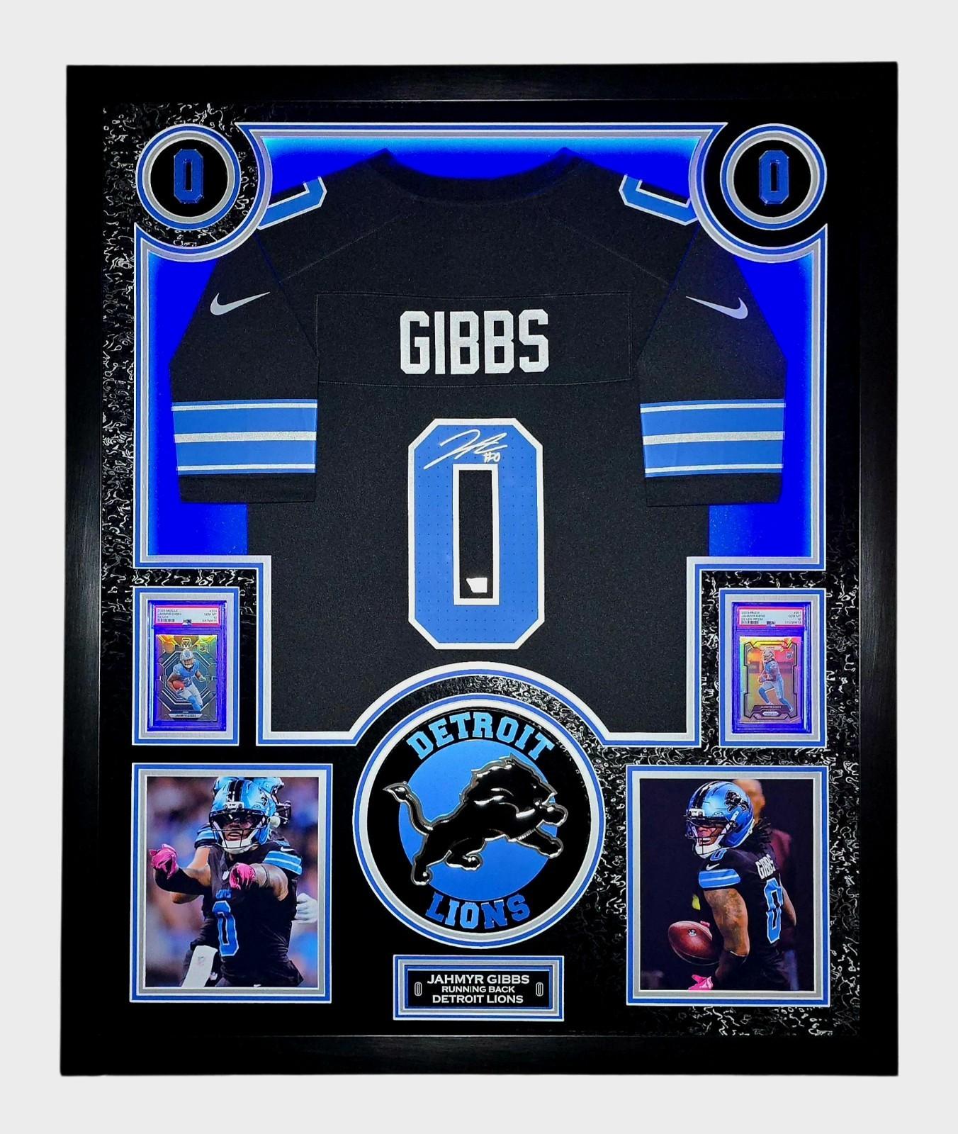 Jahmyr Gibbs Signed Lions Custom Framed LED Jersey Display with (2) PSA 10 Rookie Cards (Fanatics) at PristineAuction.com Jahmyr Gibbs Signed Lions Custom Framed LED Jersey Display with (2) PSA 10 Rookie Cards (Fanatics) at PristineAuction.com