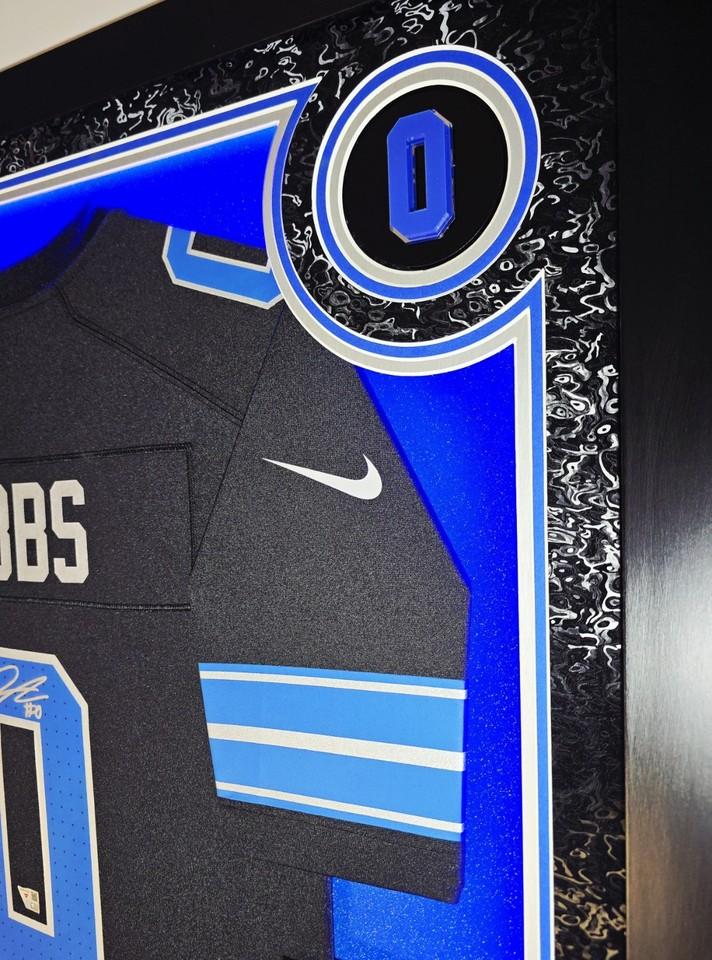 Jahmyr Gibbs Signed Lions Custom Framed LED Jersey Display with (2) PSA 10 Rookie Cards (Fanatics) at PristineAuction.com Jahmyr Gibbs Signed Lions Custom Framed LED Jersey Display with (2) PSA 10 Rookie Cards (Fanatics) at PristineAuction.com