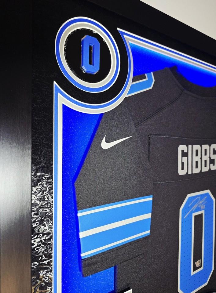 Jahmyr Gibbs Signed Lions Custom Framed LED Jersey Display with (2) PSA 10 Rookie Cards (Fanatics) at PristineAuction.com Jahmyr Gibbs Signed Lions Custom Framed LED Jersey Display with (2) PSA 10 Rookie Cards (Fanatics) at PristineAuction.com