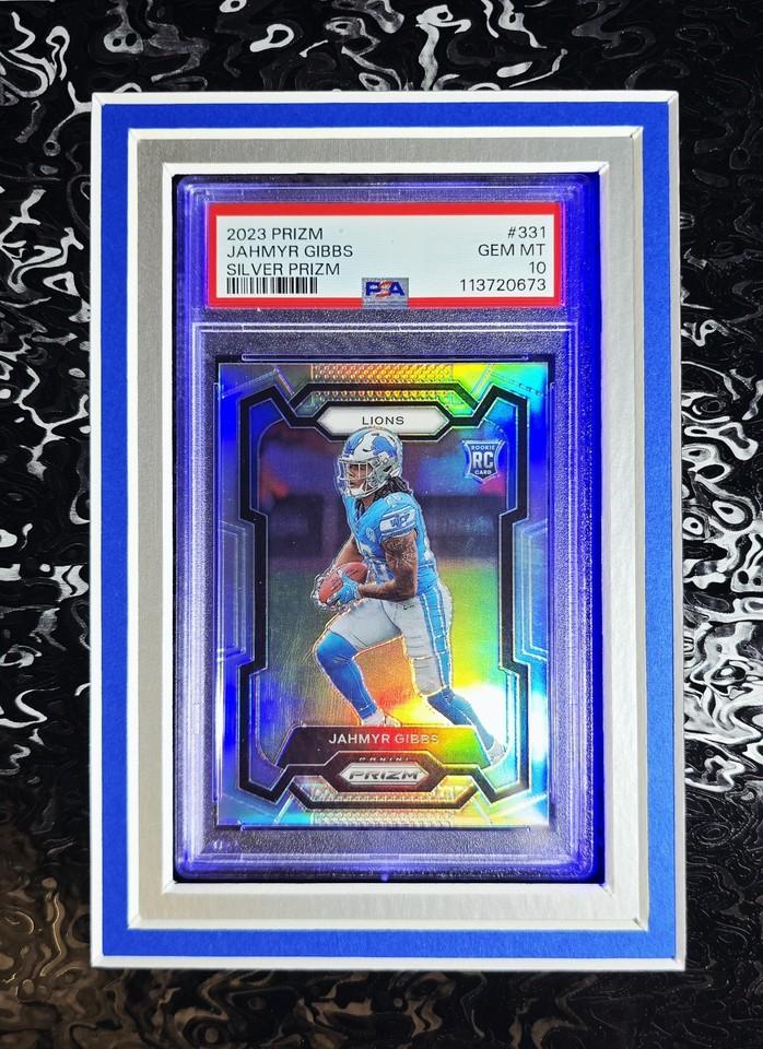 Jahmyr Gibbs Signed Lions Custom Framed LED Jersey Display with (2) PSA 10 Rookie Cards (Fanatics) at PristineAuction.com Jahmyr Gibbs Signed Lions Custom Framed LED Jersey Display with (2) PSA 10 Rookie Cards (Fanatics) at PristineAuction.com