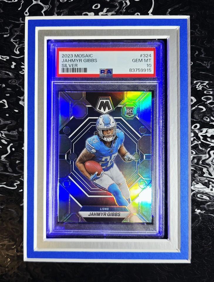 Jahmyr Gibbs Signed Lions Custom Framed LED Jersey Display with (2) PSA 10 Rookie Cards (Fanatics) at PristineAuction.com Jahmyr Gibbs Signed Lions Custom Framed LED Jersey Display with (2) PSA 10 Rookie Cards (Fanatics) at PristineAuction.com