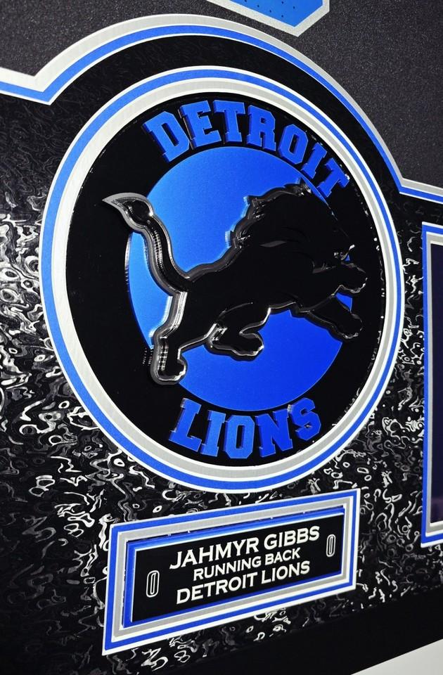 Jahmyr Gibbs Signed Lions Custom Framed LED Jersey Display with (2) PSA 10 Rookie Cards (Fanatics) at PristineAuction.com Jahmyr Gibbs Signed Lions Custom Framed LED Jersey Display with (2) PSA 10 Rookie Cards (Fanatics) at PristineAuction.com