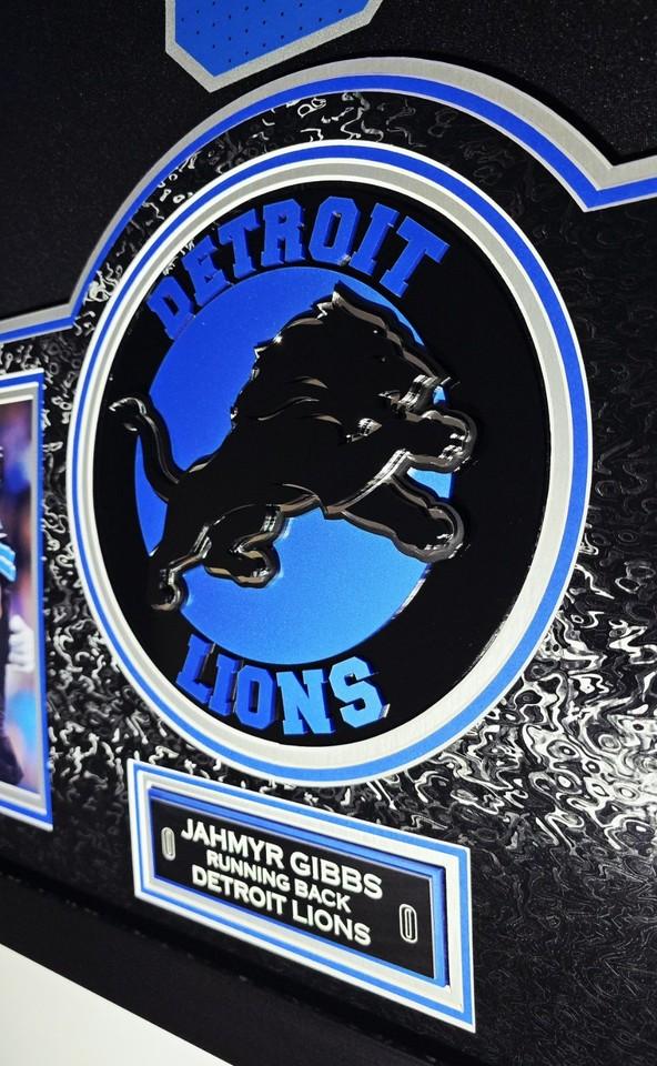 Jahmyr Gibbs Signed Lions Custom Framed LED Jersey Display with (2) PSA 10 Rookie Cards (Fanatics) at PristineAuction.com Jahmyr Gibbs Signed Lions Custom Framed LED Jersey Display with (2) PSA 10 Rookie Cards (Fanatics) at PristineAuction.com