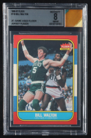Bill Walton 1986-87 Fleer #119 UER with Jersey Fusion Game-Used Floor Piece (BGS 8) at PristineAuction.com