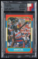 Manute Bol 1986-87 Fleer #12 RC with Jersey Fusion Game-Used Patch (Beckett Authentic) at PristineAuction.com