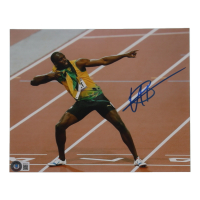Usain Bolt Signed Team Jamaica 8x10 Photo (Beckett) at PristineAuction.com