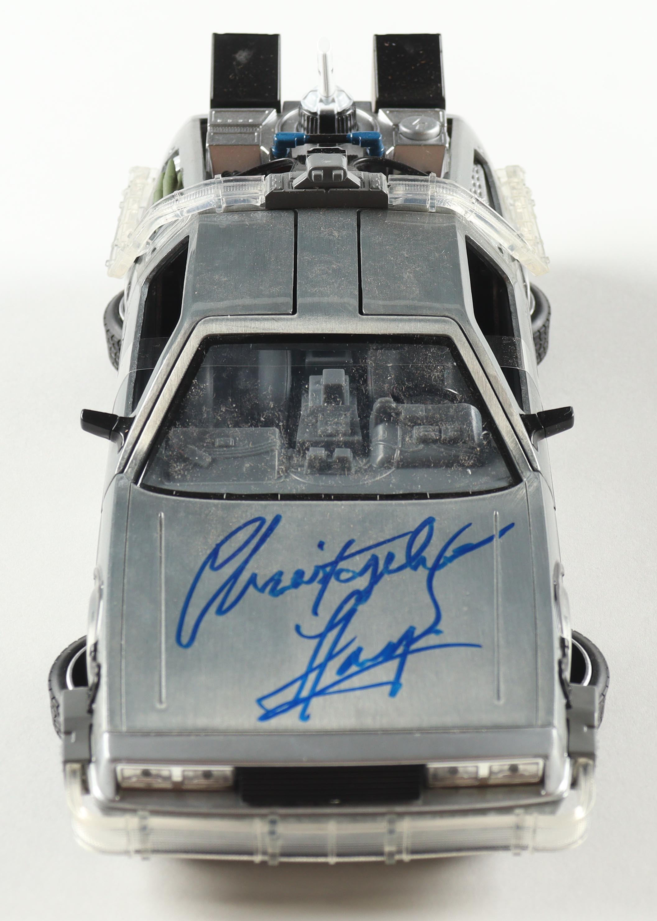 Christopher Lloyd Signed "Back to the Future" DeLorean Time Machine 1:24 Scale Die-Cast Car (Beckett) at PristineAuction.com Christopher Lloyd Signed "Back to the Future" DeLorean Time Machine 1:24 Scale Die-Cast Car (Beckett) at PristineAuction.com