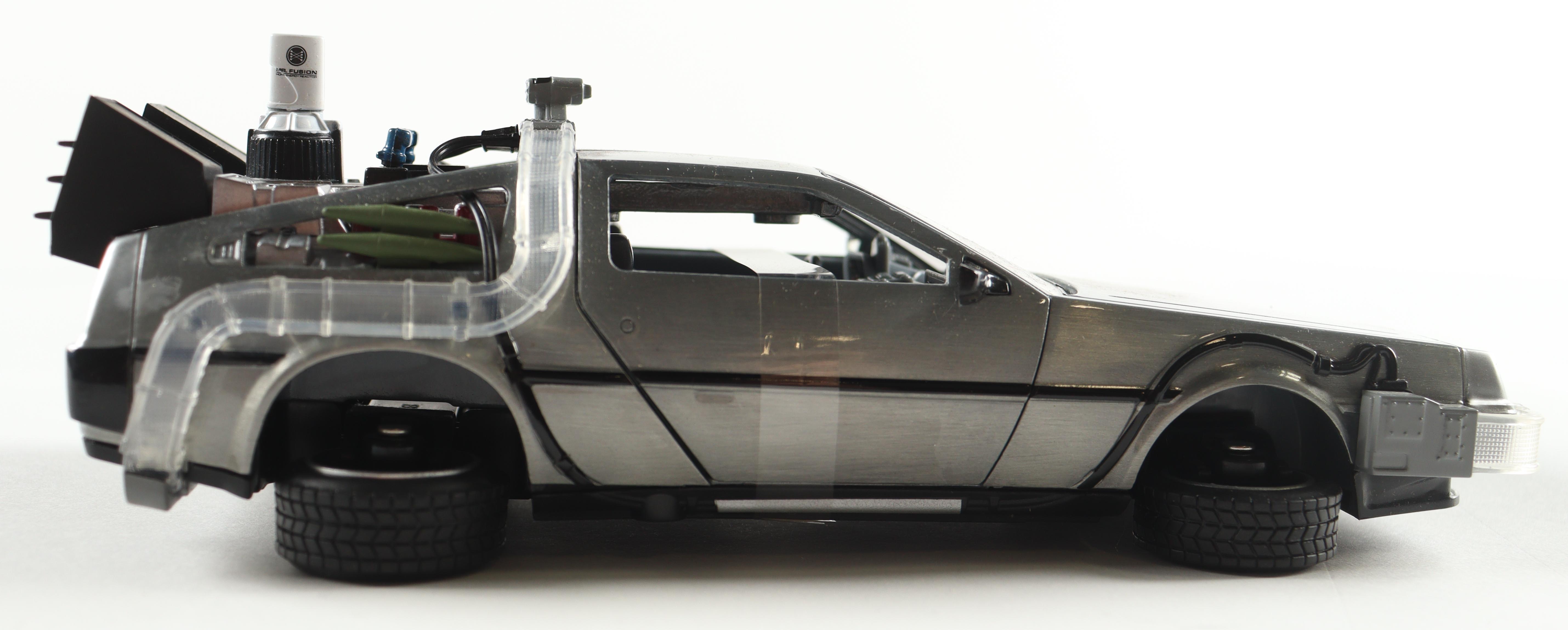 Christopher Lloyd Signed "Back to the Future" DeLorean Time Machine 1:24 Scale Die-Cast Car (Beckett) at PristineAuction.com Christopher Lloyd Signed "Back to the Future" DeLorean Time Machine 1:24 Scale Die-Cast Car (Beckett) at PristineAuction.com