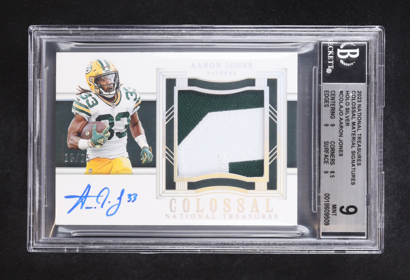 Aaron Jones 2023 Panini National Treasures Colossal Material Signatures Holo Silver Memorabilia #COL-AJ0 (BGS 9) at PristineAuction.com Aaron Jones 2023 Panini National Treasures Colossal Material Signatures Holo Silver Memorabilia #COL-AJ0 (BGS 9) at PristineAuction.com