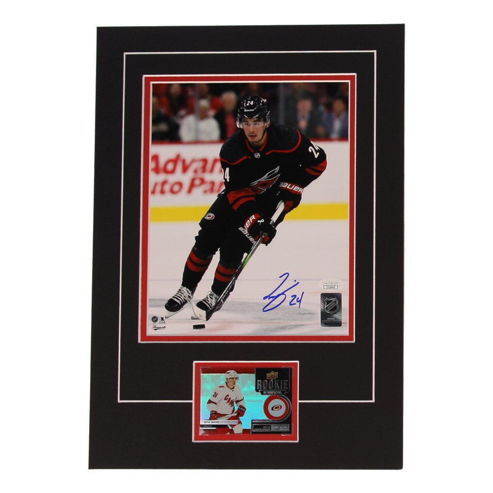 Seth Jarvis Signed Hurricanes 12x17 Custom Matted Photo Display with Trading Card (JSA) at PristineAuction.com Seth Jarvis Signed Hurricanes 12x17 Custom Matted Photo Display with Trading Card (JSA) at PristineAuction.com