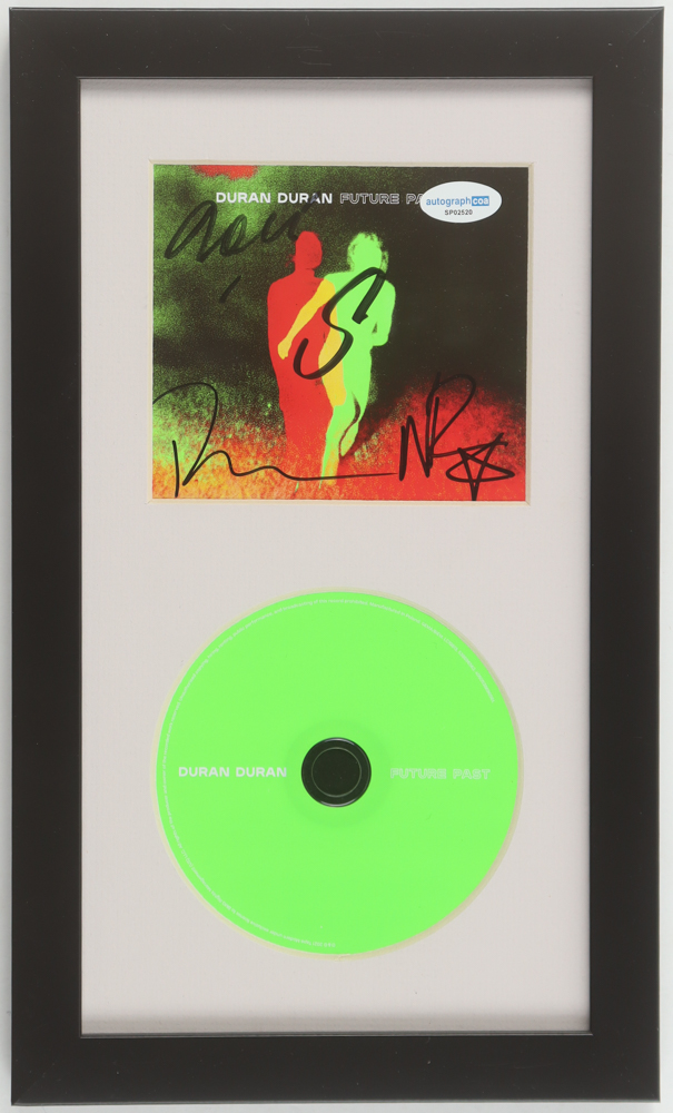 Duran Duran Custom Framed "Future Past" CD Insert Display With Disc Signed by (4) with Roger Taylor, John Taylor, Nick Rhodes & Simon Le Bon (ACOA) at PristineAuction.com Duran Duran Custom Framed "Future Past" CD Insert Display With Disc Signed by (4) with Roger Taylor, John Taylor, Nick Rhodes & Simon Le Bon (ACOA) at PristineAuction.com