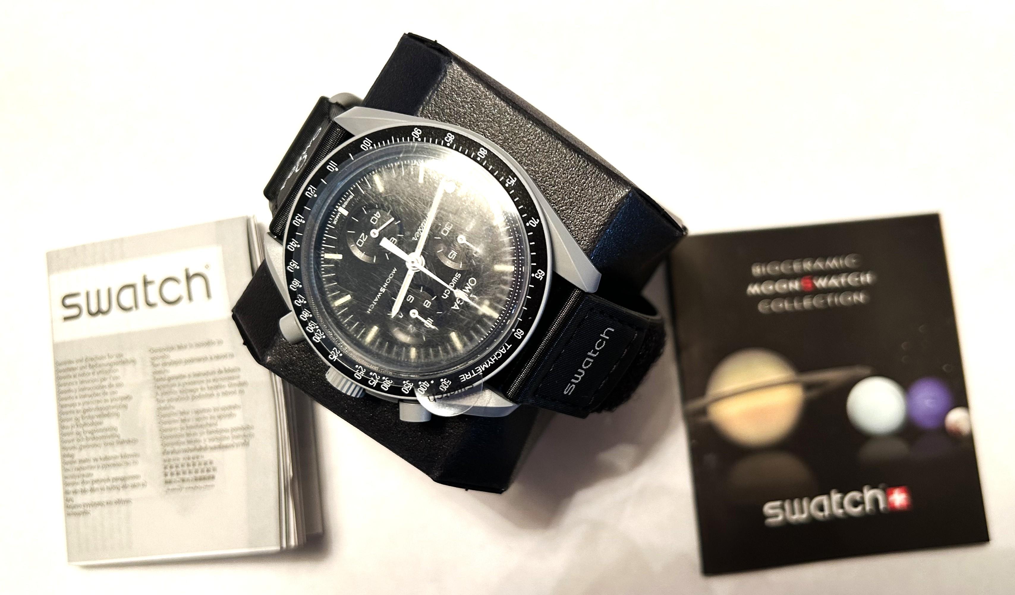 OMEGA x Swatch "Mission to the Moon" Men's 42mm Watch | Brand New with Box & Papers at PristineAuction.com OMEGA x Swatch "Mission to the Moon" Men's 42mm Watch | Brand New with Box & Papers at PristineAuction.com