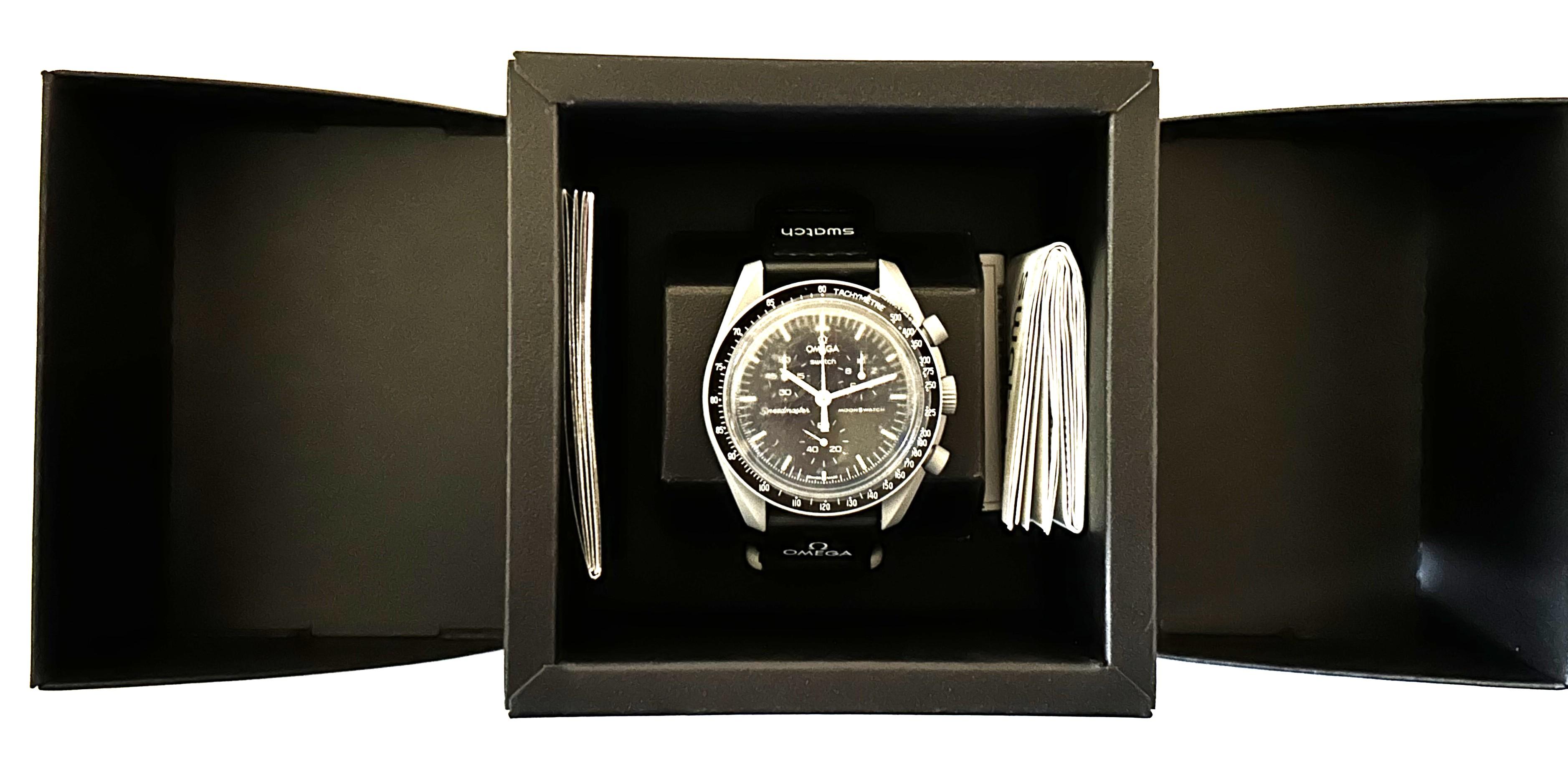 OMEGA x Swatch "Mission to the Moon" Men's 42mm Watch | Brand New with Box & Papers at PristineAuction.com OMEGA x Swatch "Mission to the Moon" Men's 42mm Watch | Brand New with Box & Papers at PristineAuction.com