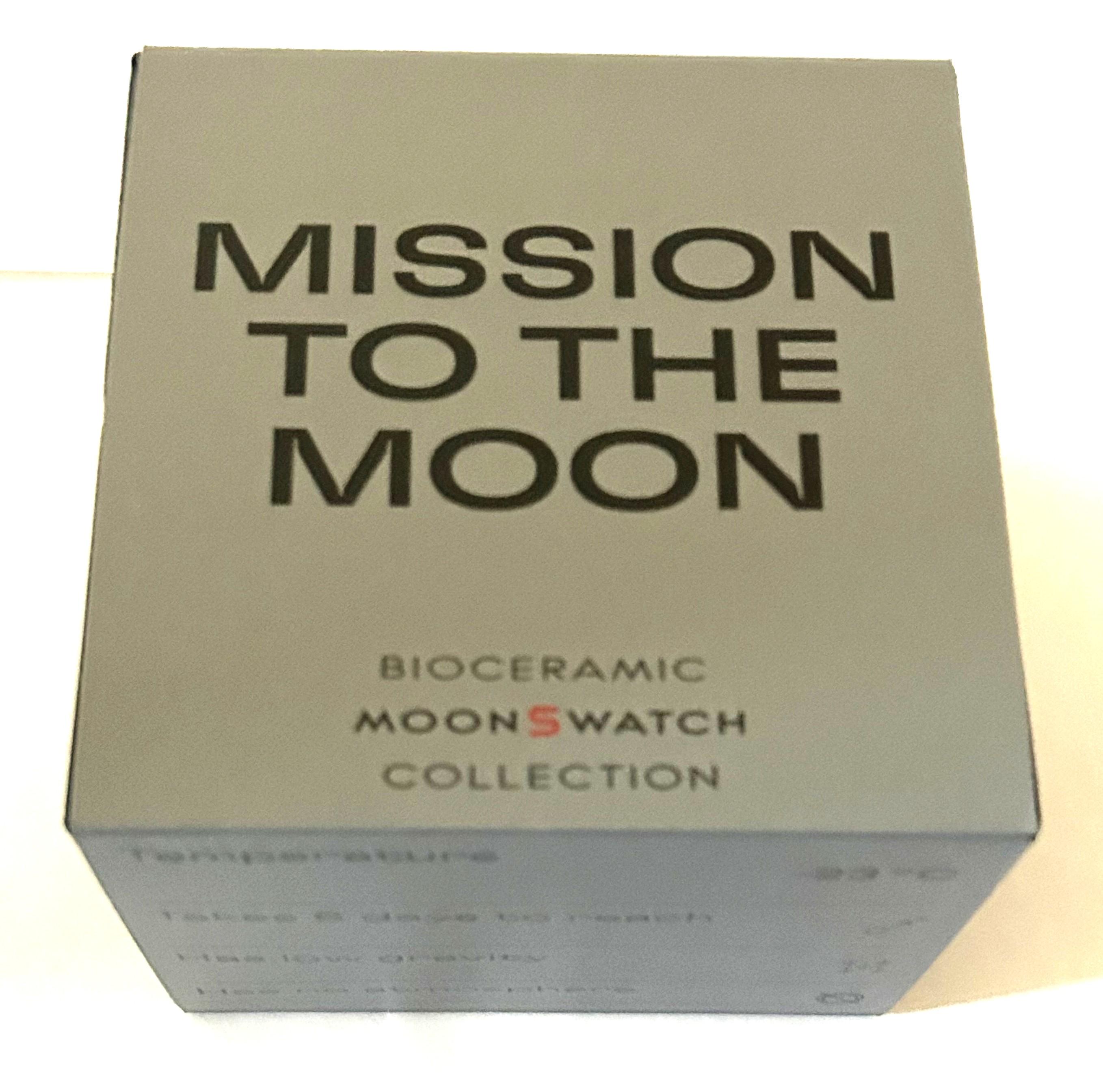 OMEGA x Swatch "Mission to the Moon" Men's 42mm Watch | Brand New with Box & Papers at PristineAuction.com OMEGA x Swatch "Mission to the Moon" Men's 42mm Watch | Brand New with Box & Papers at PristineAuction.com
