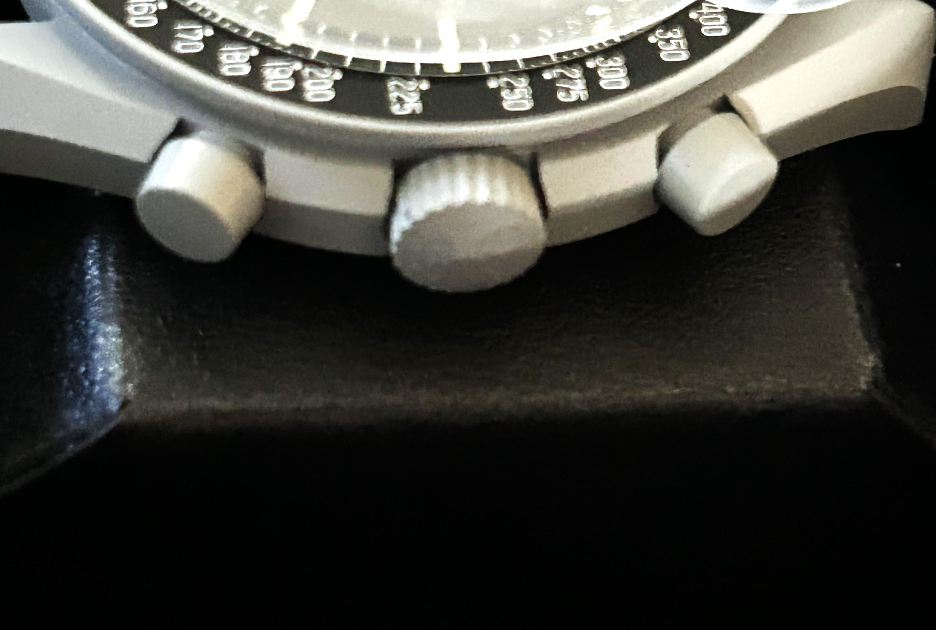 OMEGA x Swatch "Mission to the Moon" Men's 42mm Watch | Brand New with Box & Papers at PristineAuction.com OMEGA x Swatch "Mission to the Moon" Men's 42mm Watch | Brand New with Box & Papers at PristineAuction.com