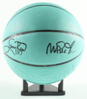 Larry Bird & Magic Johnson Signed Tiffany and Co. NBA Basketball With Display Stand (PSA & Beckett) at PristineAuction.com